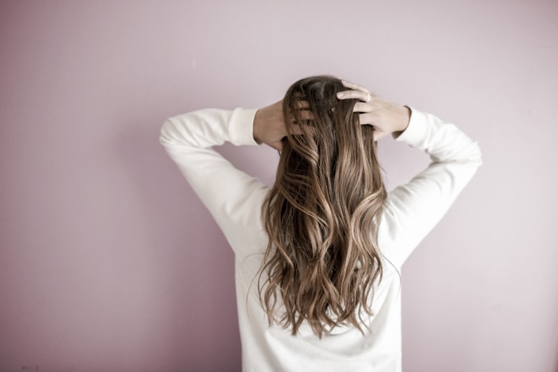 Rich auburn hair colour in salon lighting